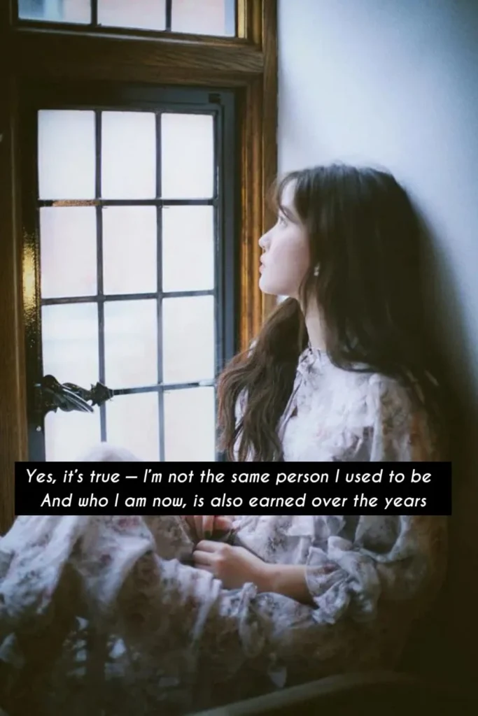  Woman sitting by sunlit window in soft dress, time changes a person poem moment