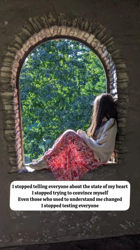 girl sitting in a stone window arch, poetry about giving up on people and testing everyone