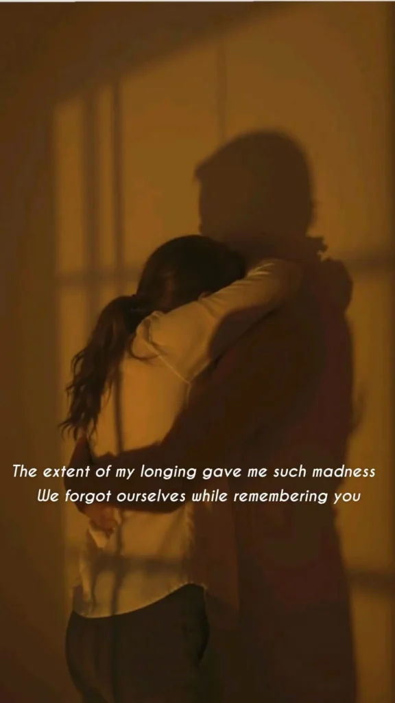 couple embracing in warm golden light, junoon shayari