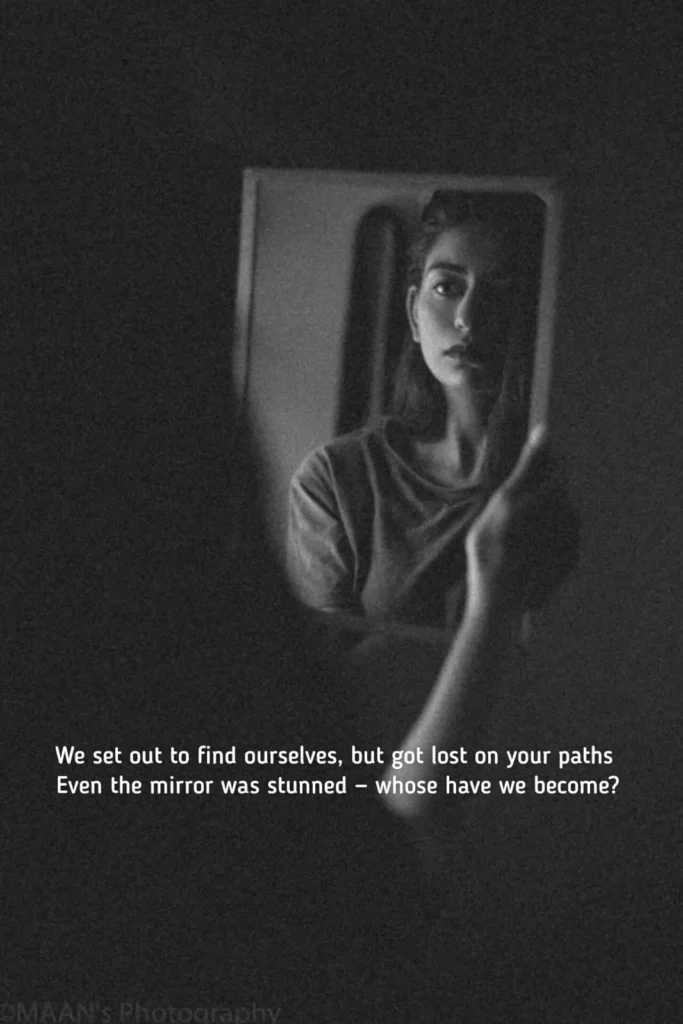 girl holding a mirror looking at her reflection, junoon shayari