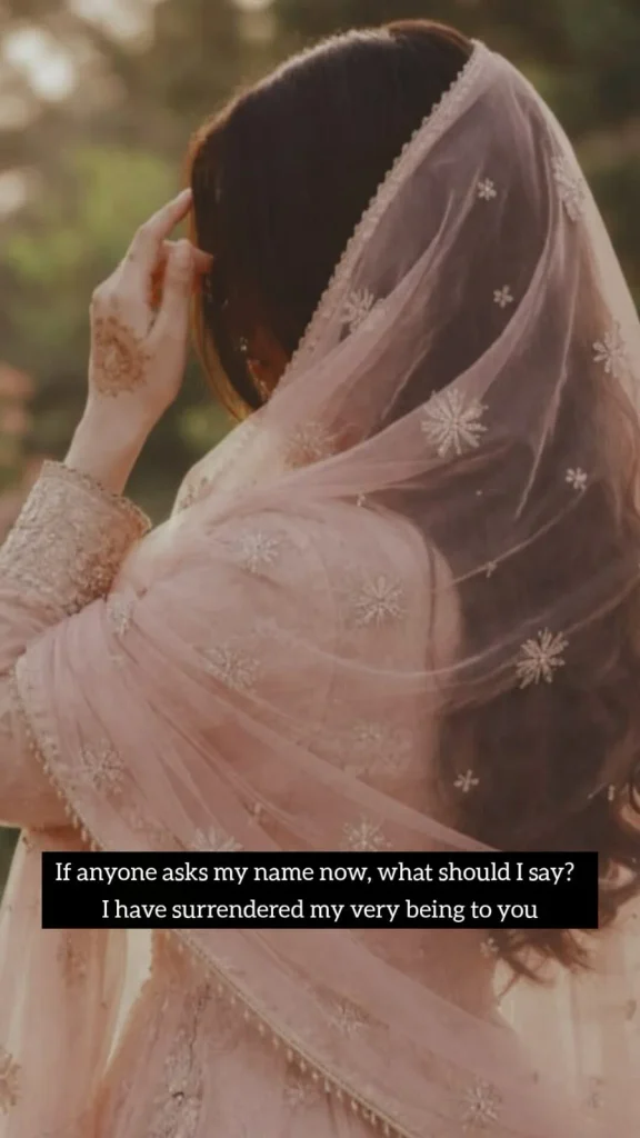 khud ko khona ishq mein — woman in a delicate veil hiding her face in quiet grief